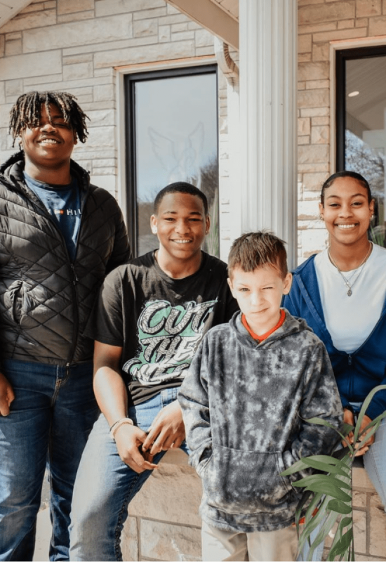 Family standing outside of church